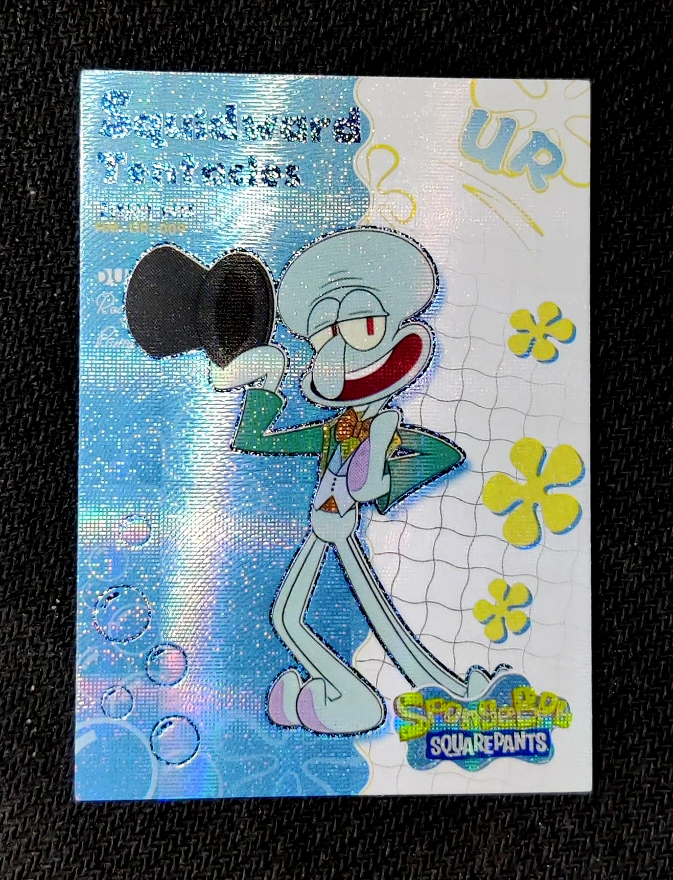 carte ultra rare UR n°09 provenant du TCG Bob L'Éponge Premium (série 1)