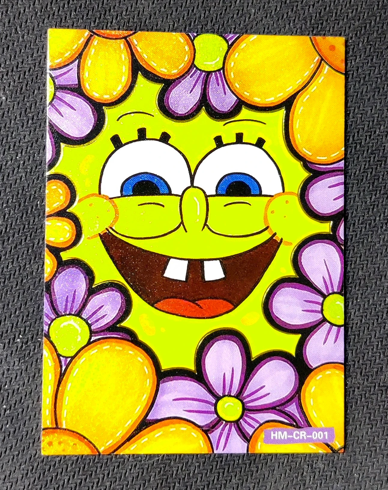 carte ultra rare CR n°01 provenant du TCG Bob L'Éponge Premium (série 1)